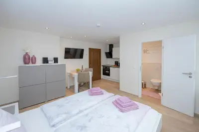 Ein Bett oder Betten in einem Zimmer der Unterkunft Studio Apartment am historischen Matthiasturm