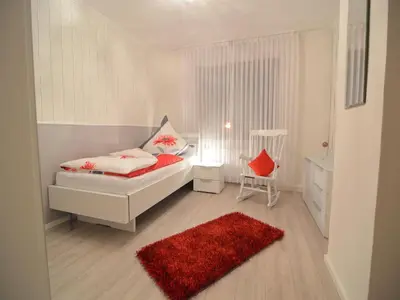 Ein Bett oder Betten in einem Zimmer der Unterkunft Ferienhaus Paula in Haserich im Hunsrueck