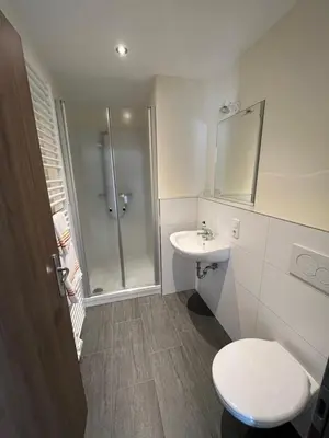 Ein Badezimmer in der Unterkunft Haus Claudia