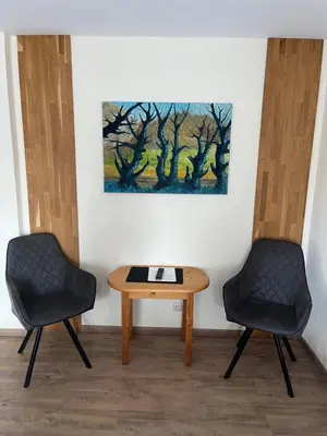 Ein Sitzbereich in der Unterkunft Haus Claudia