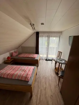 Ein Bett oder Betten in einem Zimmer der Unterkunft Haus Claudia