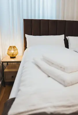 Ein Bett oder Betten in einem Zimmer der Unterkunft Rennglück Apartments
