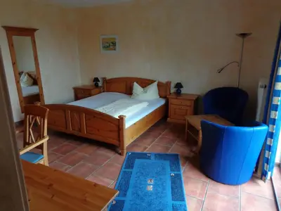 Ein Bett oder Betten in einem Zimmer der Unterkunft Hotel Leo's Ruh