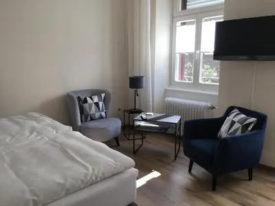 Ein Sitzbereich in der Unterkunft Ferienwohnung Heuser II