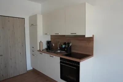 Küche/Küchenzeile in der Unterkunft ISA Rheinquartier - Moderne und barrierefreie Ferienapartments