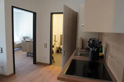 Küche/Küchenzeile in der Unterkunft ISA Rheinquartier - Moderne und barrierefreie Ferienapartments