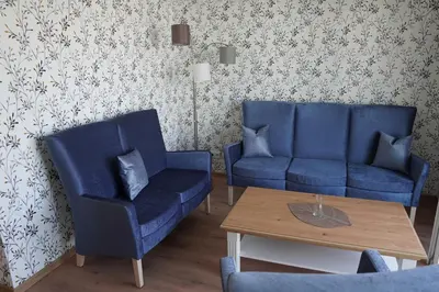 Ein Sitzbereich in der Unterkunft ISA Rheinquartier - Moderne und barrierefreie Ferienapartments