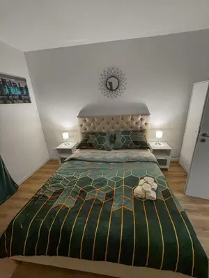 Ein Bett oder Betten in einem Zimmer der Unterkunft Gemütliches Zimmer in Rheinnähe