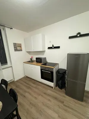 Küche/Küchenzeile in der Unterkunft Gemütliches Zimmer in Rheinnähe