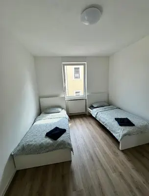Ein Bett oder Betten in einem Zimmer der Unterkunft Gemütliches Zimmer in Rheinnähe