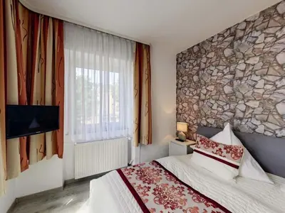 Ein Bett oder Betten in einem Zimmer der Unterkunft Stad Vakantiehuis Daun