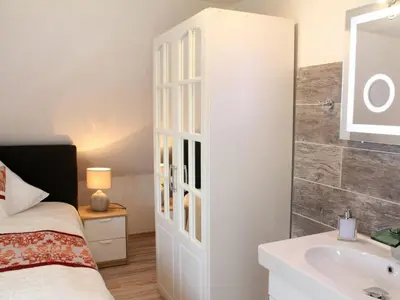 Ein Bett oder Betten in einem Zimmer der Unterkunft Stad Vakantiehuis Daun
