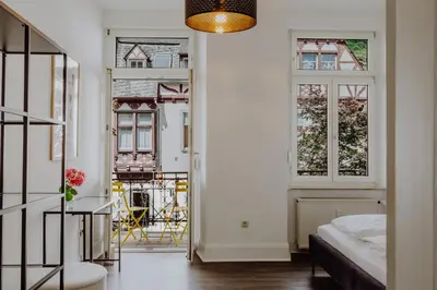 Ein Bett oder Betten in einem Zimmer der Unterkunft Alte Redaktion