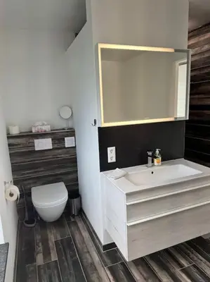 Ein Badezimmer in der Unterkunft Modernes Ferienhaus in Üdersdorf