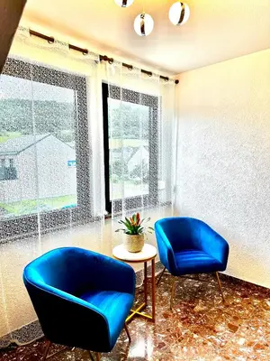 Ein Sitzbereich in der Unterkunft HAUS BENICO -Pension-