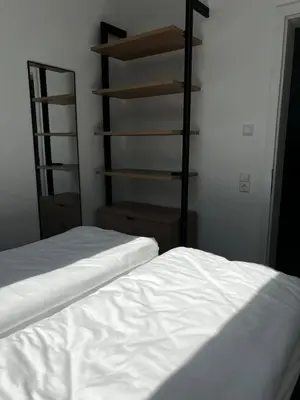 Ein Bett oder Betten in einem Zimmer der Unterkunft Ferienwohnung Weitblick