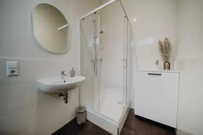 Ein Badezimmer in der Unterkunft LLR Design Apartment - Soleil Blanc im Zentrum von Koblenz