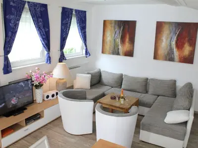 Ein Sitzbereich in der Unterkunft Stad Vakantiehuis Vulkaneifel