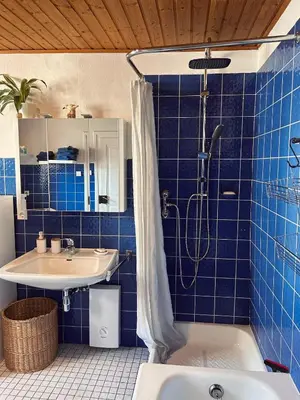 Ein Badezimmer in der Unterkunft Zehntscheune Trier
