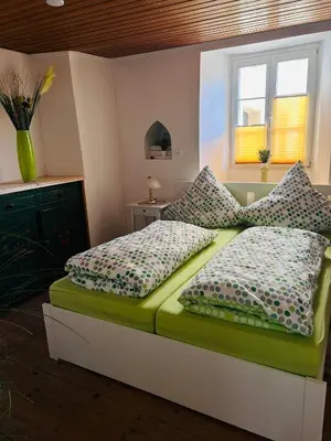 Ein Bett oder Betten in einem Zimmer der Unterkunft Zehntscheune Trier