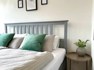 Ein Bett oder Betten in einem Zimmer der Unterkunft Ferienwohnung an der Eisdiele