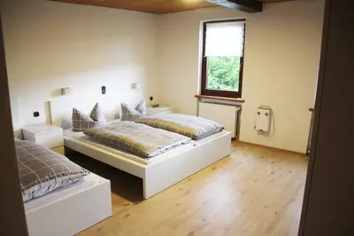 Ein Bett oder Betten in einem Zimmer der Unterkunft Hotel Zur Krone