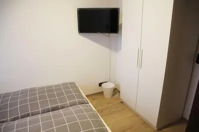 Ein Bett oder Betten in einem Zimmer der Unterkunft Hotel Zur Krone