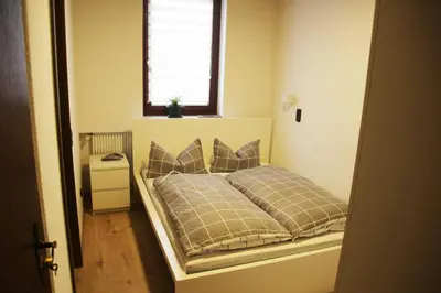 Ein Bett oder Betten in einem Zimmer der Unterkunft Hotel Zur Krone