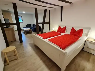 Ein Bett oder Betten in einem Zimmer der Unterkunft Vakwerkhuis met charme
