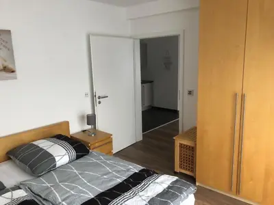 Ein Bett oder Betten in einem Zimmer der Unterkunft Fewo Rhein-Lahn OG2-1