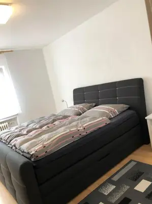 Ein Bett oder Betten in einem Zimmer der Unterkunft Ferienwohnung Sara