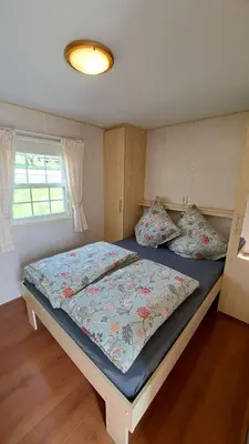 Ein Bett oder Betten in einem Zimmer der Unterkunft Abendrot