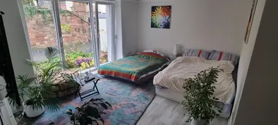 Ein Bett oder Betten in einem Zimmer der Unterkunft Ferienwohnung Trier-Euren