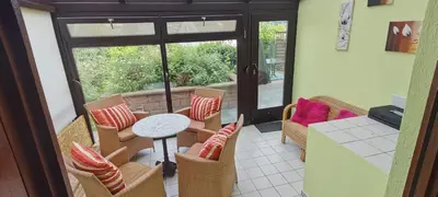 Ein Sitzbereich in der Unterkunft Ferienwohnung Trier-Euren