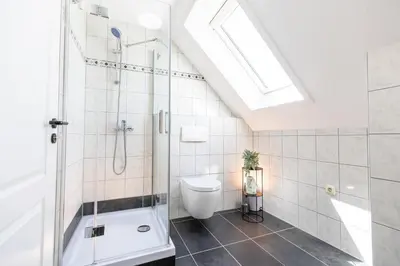 Ein Badezimmer in der Unterkunft Pitlane-Apartment 2