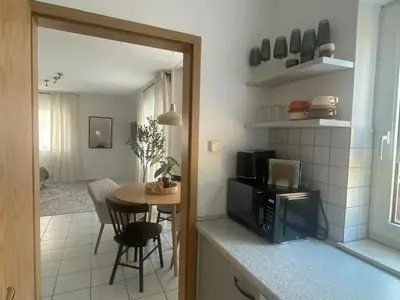 Küche/Küchenzeile in der Unterkunft Moderne Wohnung mit Terrasse & Parkplatz; Nähe BWZK & Amazon
