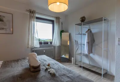 Ein Bett oder Betten in einem Zimmer der Unterkunft Cozy II Luxuriös Moselview Terrasse Garten NETFLIX