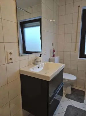 Ein Badezimmer in der Unterkunft Gemütliche Ferienwohnung