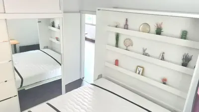 Ein Bett oder Betten in einem Zimmer der Unterkunft Maxi-Appartement zum gechillten Hirsch OG Traben-Trarbach