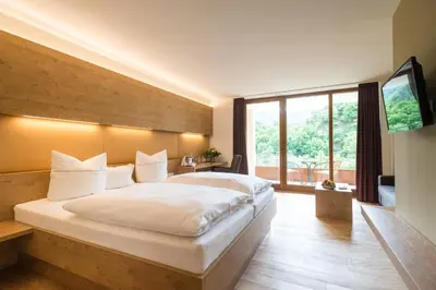 Ein Bett oder Betten in einem Zimmer der Unterkunft Ruland's Brunnenhaus
