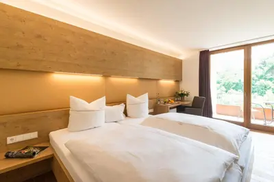 Ein Bett oder Betten in einem Zimmer der Unterkunft Ruland's Brunnenhaus