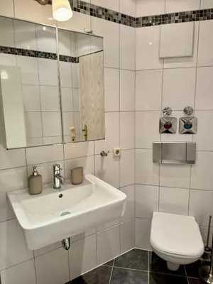 Ein Badezimmer in der Unterkunft Ferienwohnung Seensucht Bostalsee