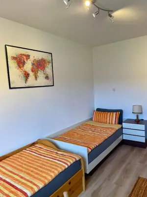 Ein Bett oder Betten in einem Zimmer der Unterkunft Ferienwohnung Marx