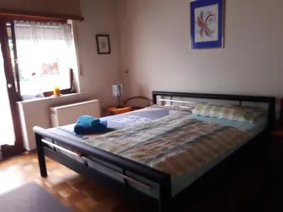 Ein Bett oder Betten in einem Zimmer der Unterkunft Ferienwohnung Huhn