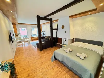 Ein Bett oder Betten in einem Zimmer der Unterkunft Loreley - Traumferien am Rhein