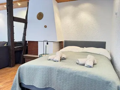 Ein Bett oder Betten in einem Zimmer der Unterkunft Loreley - Traumferien am Rhein