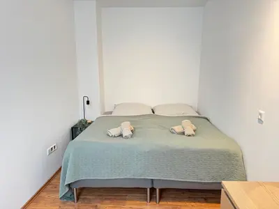 Ein Bett oder Betten in einem Zimmer der Unterkunft Loreley - Traumferien am Rhein