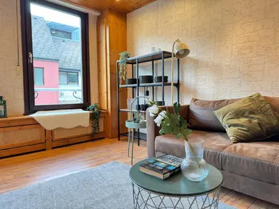 Ein Sitzbereich in der Unterkunft Großes Apartment an der Loreley