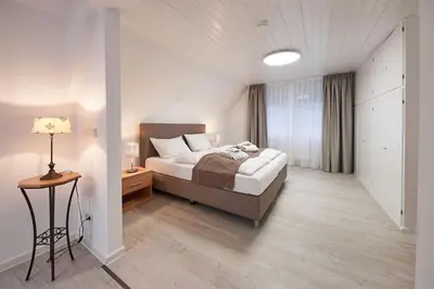 Ein Bett oder Betten in einem Zimmer der Unterkunft Ferienhaus mit Privaten Spabereich