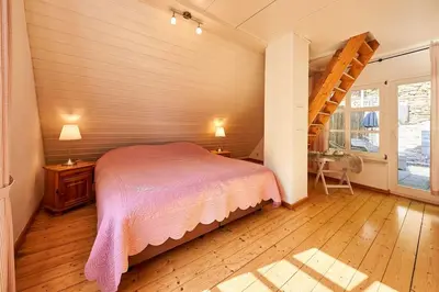Ein Bett oder Betten in einem Zimmer der Unterkunft Ferienhaus mit Whirlpool und Sauna